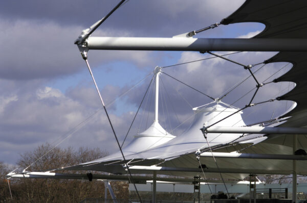 Canopy Replacement: How Replacing Old Fabric Canopies Improves Building Lifespan